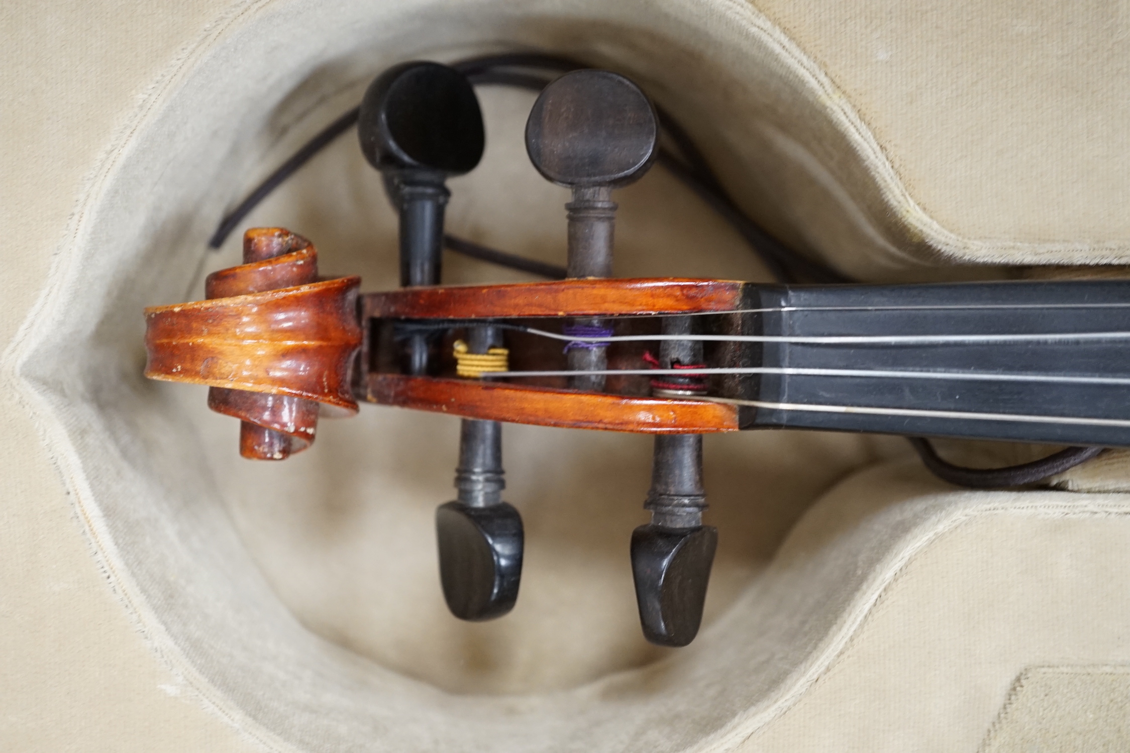 A Czechoslovakian student’s violin with Stradivarius label inside the body, length of body, 35.5cm, in a good modern case with fitted hygrometer